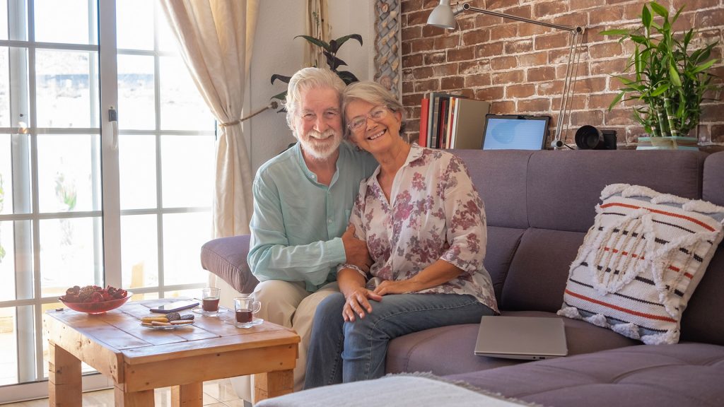 Happy senior couple moving into a new home in Lethbridge